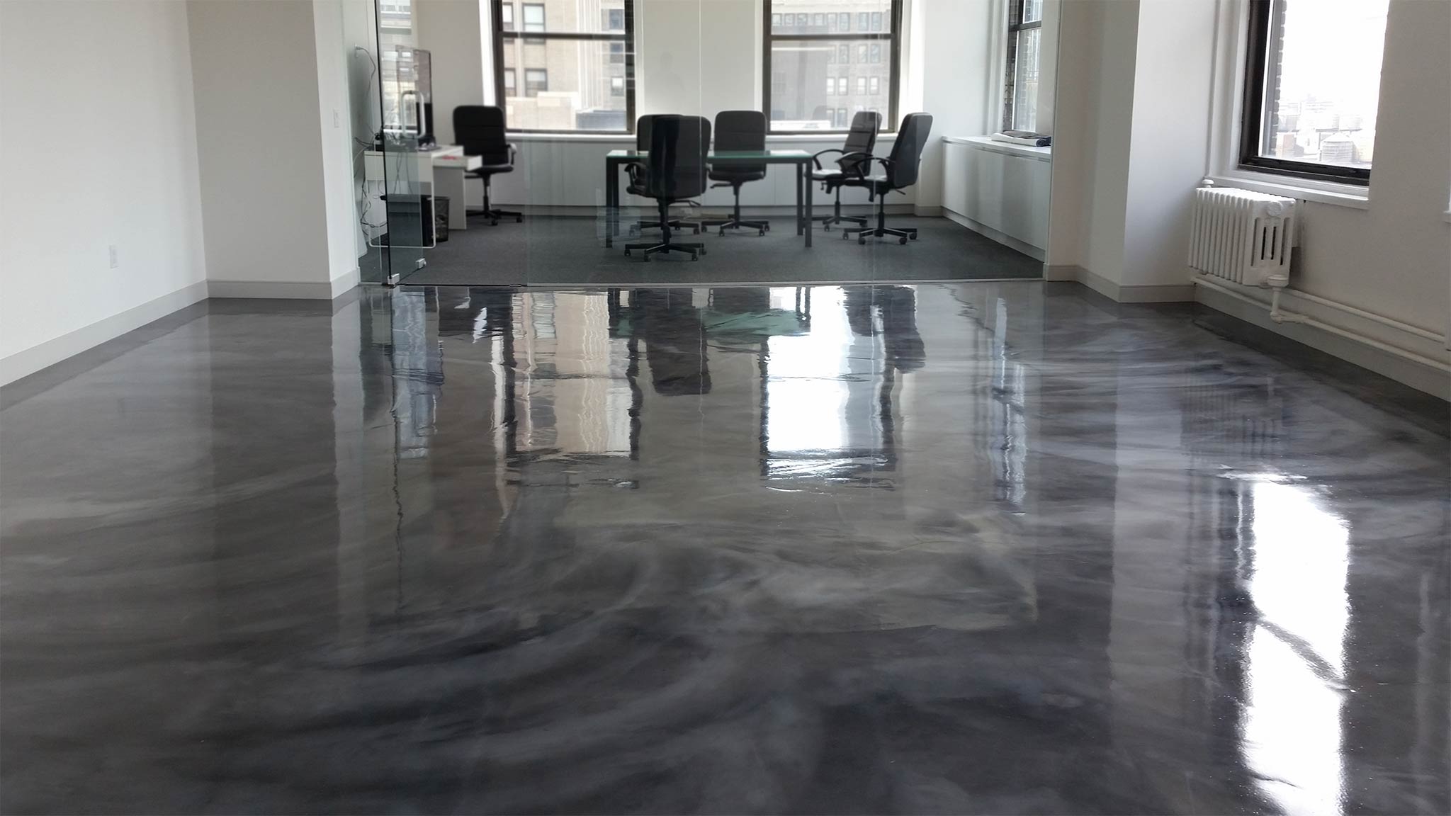 Polished concrete floor in the gallery by Duraamen