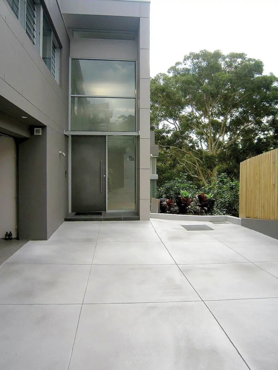 Sprayable Microcement Flooring Used To Resurface A Driveway